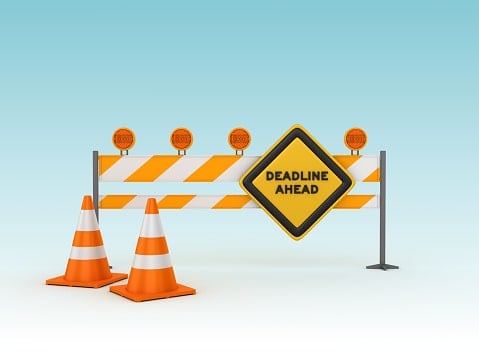Mechanics lien deadlines sign with cones